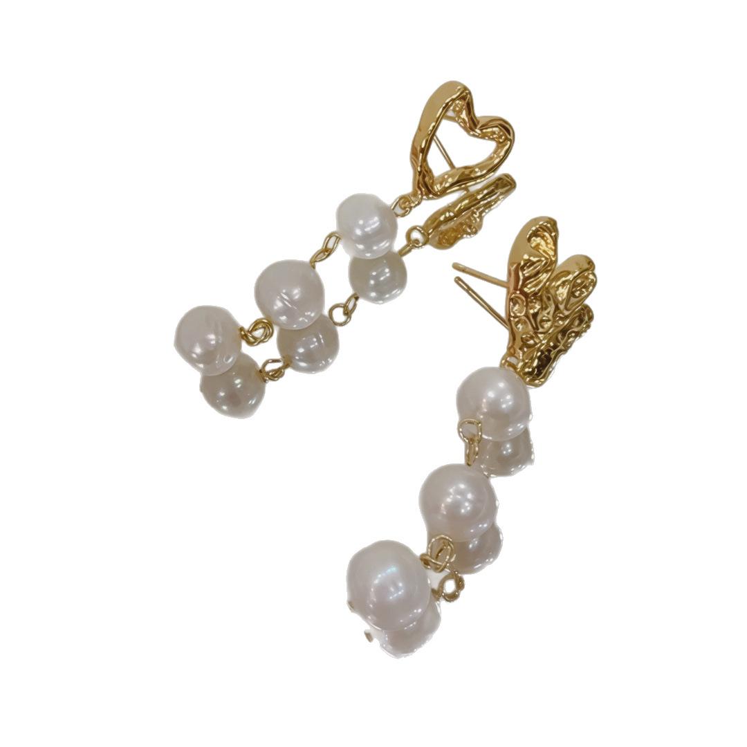 

Asymmetrical love earrings, natural freshwater baroque threaded pearl earrings, women s stud earrings, niche design versatile sterling silver needle / asymmetrical