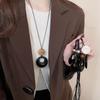 New Chinese leather pendant, fringed necklace, female ethnic style, niche retro sweater chain, fashion and high-end item jewelry.