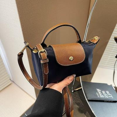 Super Fire Mini Girl Nische Tragbare Knödeltasche High-End Nylon Tuch Messenger Handytasche