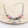 Handmade Beaded Bracelet with Elephant and Heart Key Pendant Featuring Crystal Heart Charms