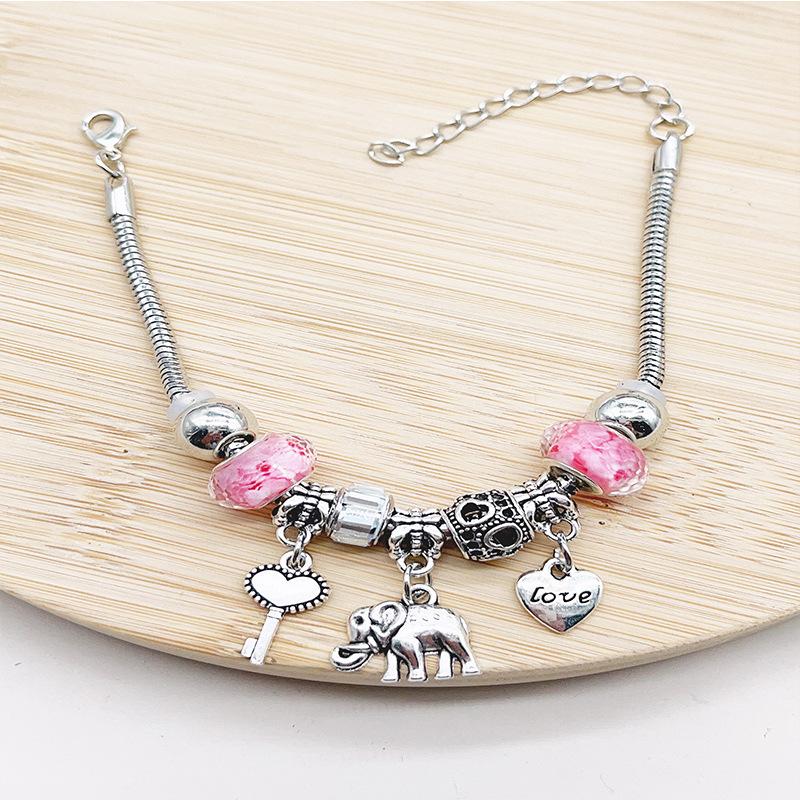 Handmade Beaded Bracelet with Elephant and Heart Key Pendant Featuring Crystal Heart Charms