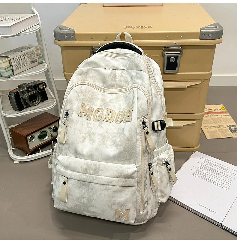 Schoolbag manufacturers wholesale backpack large capacity air cushion outdoor travel bag computer bag lightweight junior high school high school