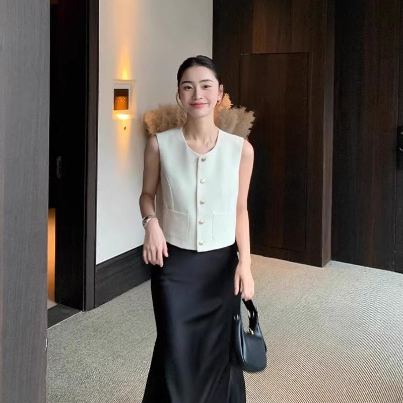 Dames fransk rund hals enkeltspent dobbel lomme ermeløs avslappet strikket vest