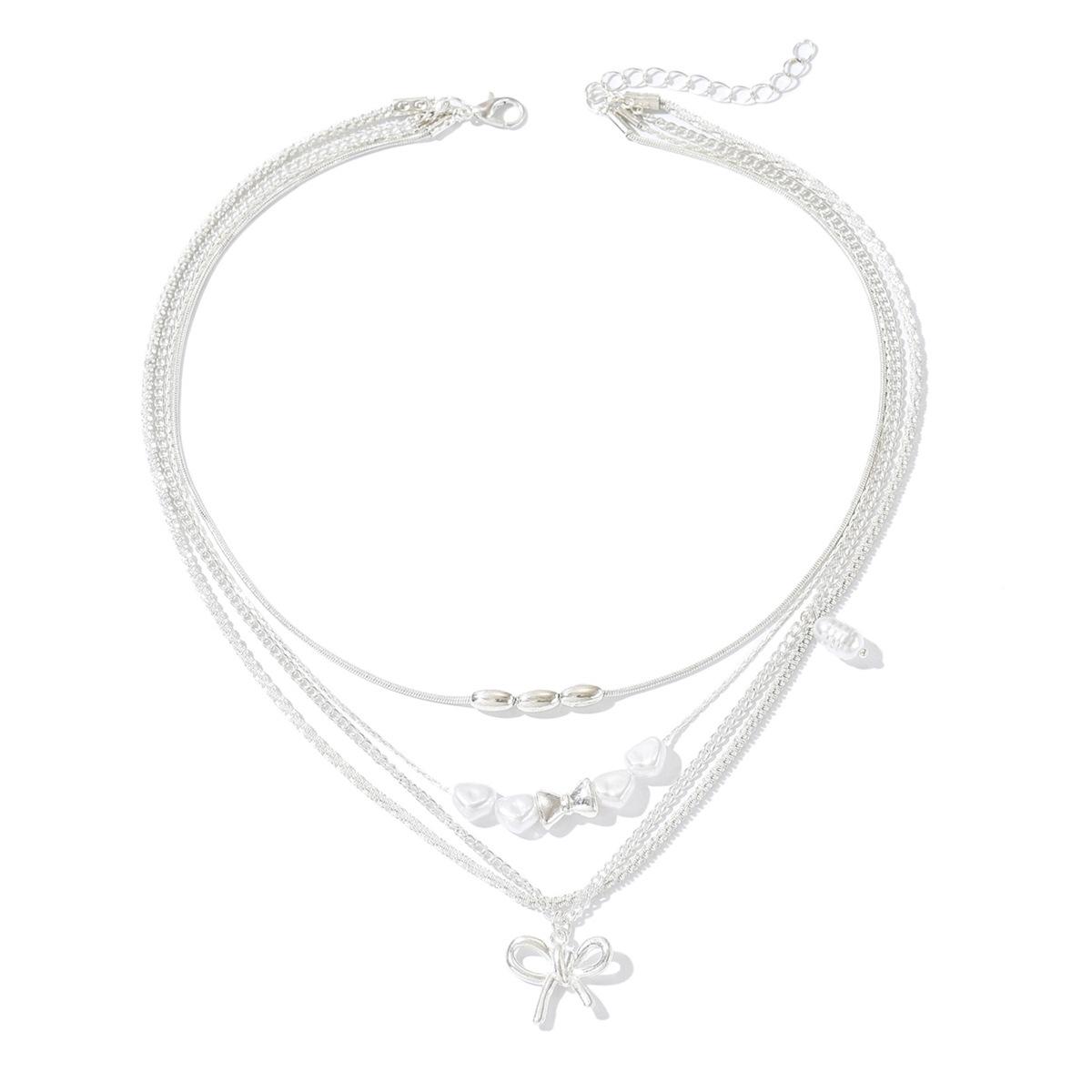 Wear bow collarbone chain wholesale European and American multi-layer stacked accessories niche imitation pearl light luxury high-end necklace