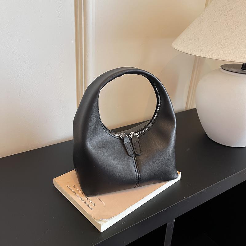 New women's bags on the bag, new trendy and foreign versatile shoulder bags, large-capacity handbags, mini messenger bags.