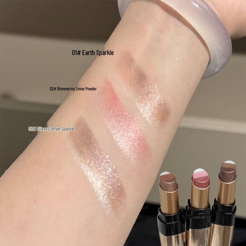 Tri-Color Pearlescent Foil Eyeshadow Stick: No-Fallout, Long-Lasting Glitter Eye Makeup with Easy One-Swipe Application and Gradient Effect.