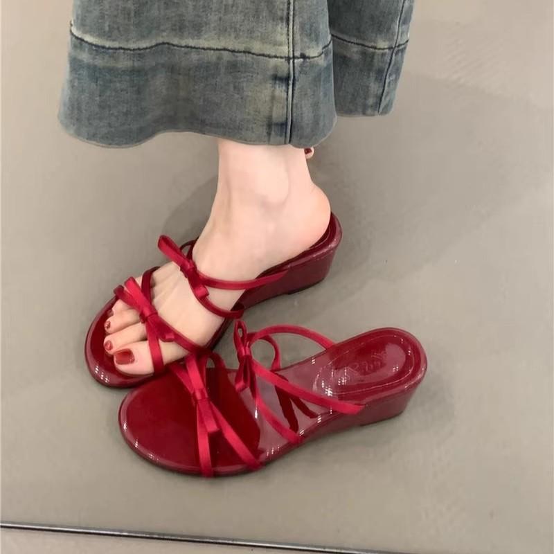 Keilabsatz sanfte Abendbrise Schleife Hausschuhe 2025 Sommer neu Französisches Temperament elegant lila mit Rock Sandalen