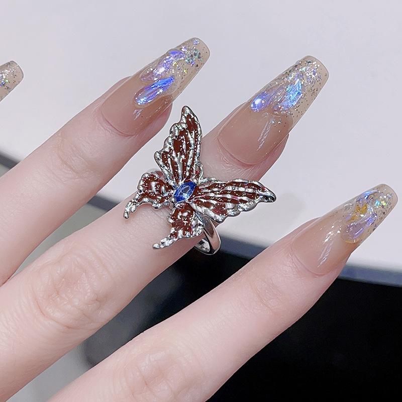 

Oil Dripping Irregular Three-Dimensional Butterfly Opening Ring Female Niche Design Sense Adjustable Index Finger Ring Cold Wind Ring Adjustable opening