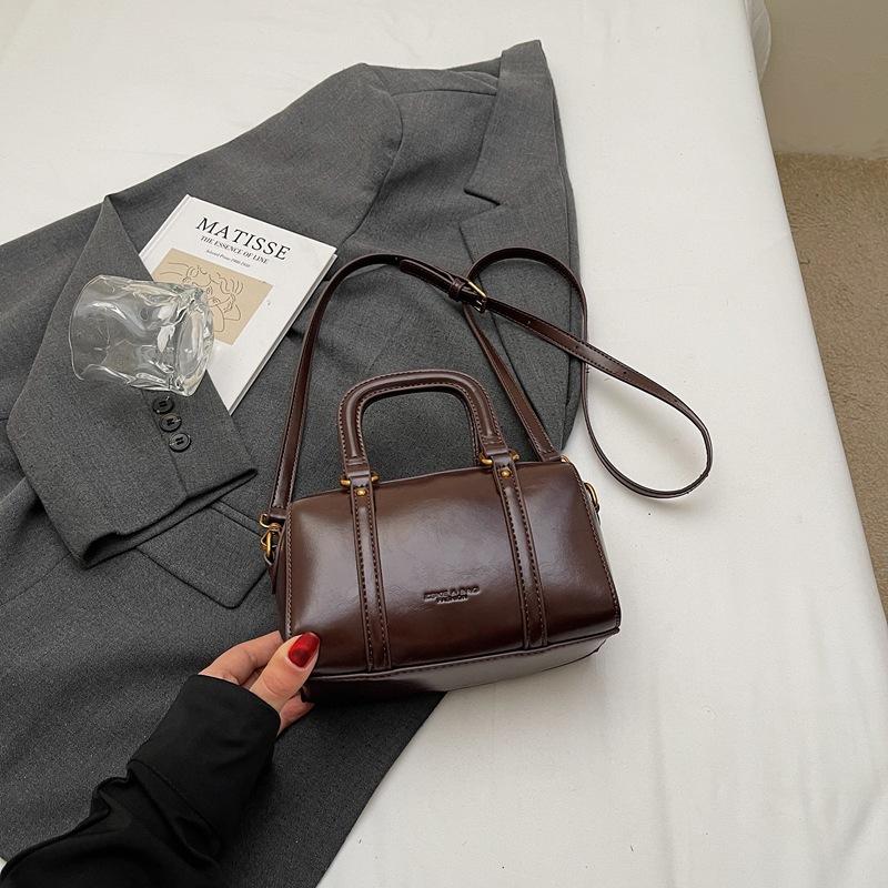 New niche popular simple solid color double pull portable shoulder messenger women's bag