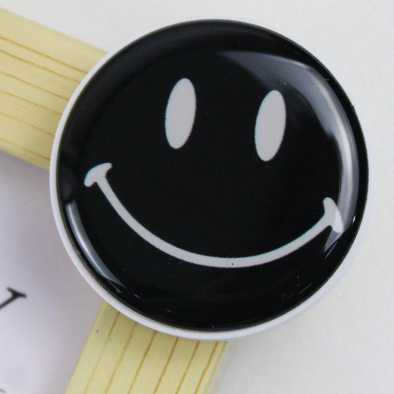 

Universal foldable circular cute smiley face mobile phone handle, foldable finger extension stand AVE чорний