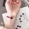 Here's a small red flower for you: a hand-woven bracelet made of cinnabar red garnet, the same style as the one featured on Little Red Book