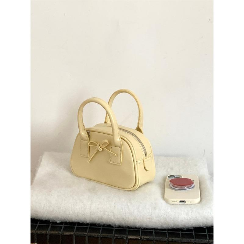 

New bow small handbag styling hand carry saddle bag niche one shoulder messenger bag women бежевый