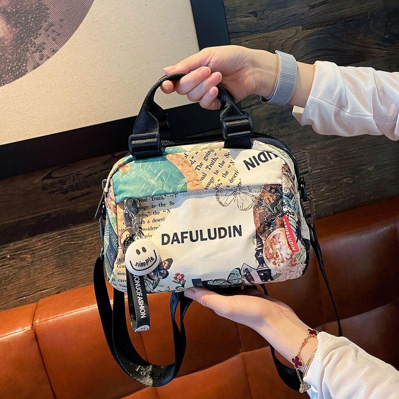 

Fashion Lightweight Oxford Cloth Women s Bag 2025 New Super Popular Casual Messenger Bag Women Double-Layer Travel Small Handbag Fresh and elegant