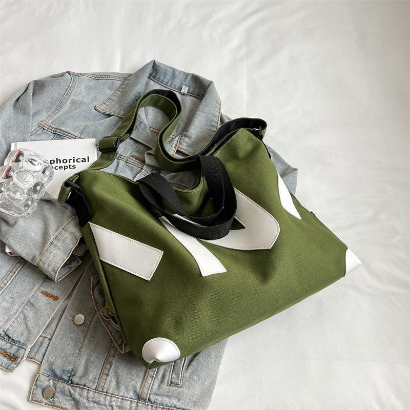 Canvas bag women's new fashionable large-capacity class commuter messenger tote bag student casual tote bag