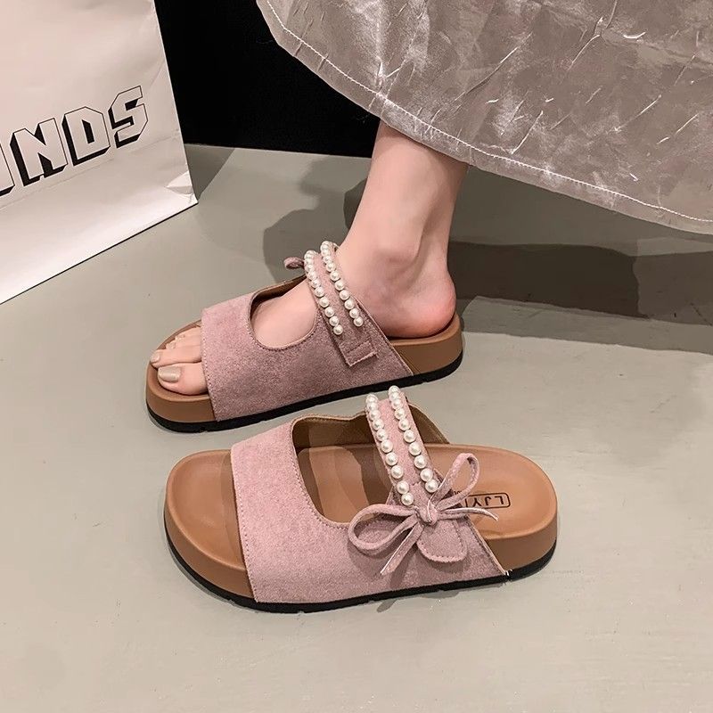

Sweet pearl bow flat bottom set toe one-word women 2025 summer new beach wear Birkencool slippers 40