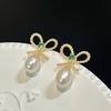 Fashion Light Luxury Natural Freshwater Pearl Stud Earrings Women's Small and Simple Design Versatile French Retro Bow Earrings 2026