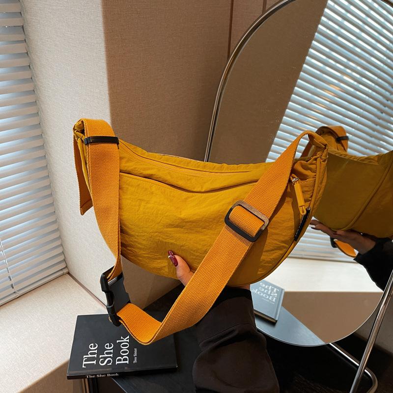 

Summer bag women s versatile dumpling bag lightweight Oxford cloth high-end sports messenger bag tide жёлтый