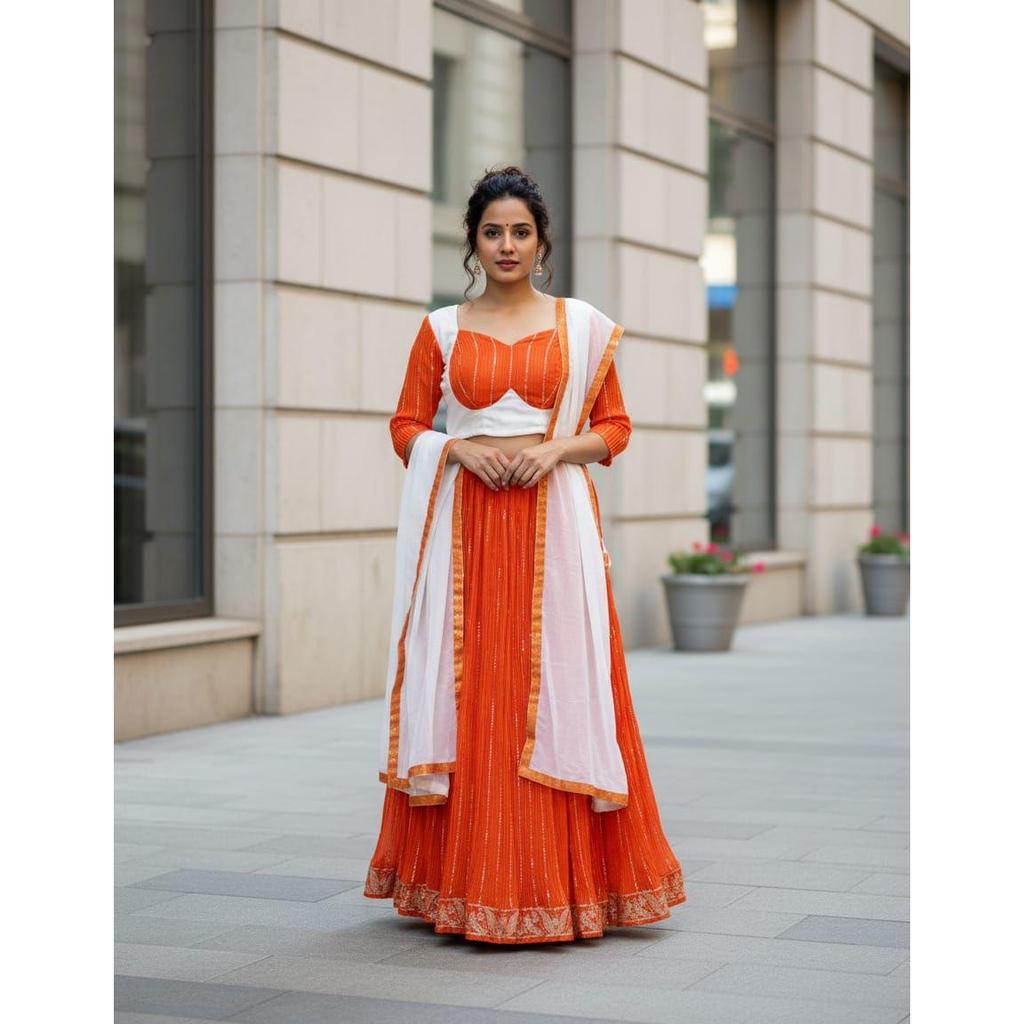 Lehenga Choli Prezentând un lehenga din șifon perfect amestecat pentru sezonul festiv pentru a fermeca aspectul dumneavoastră colecția 2026