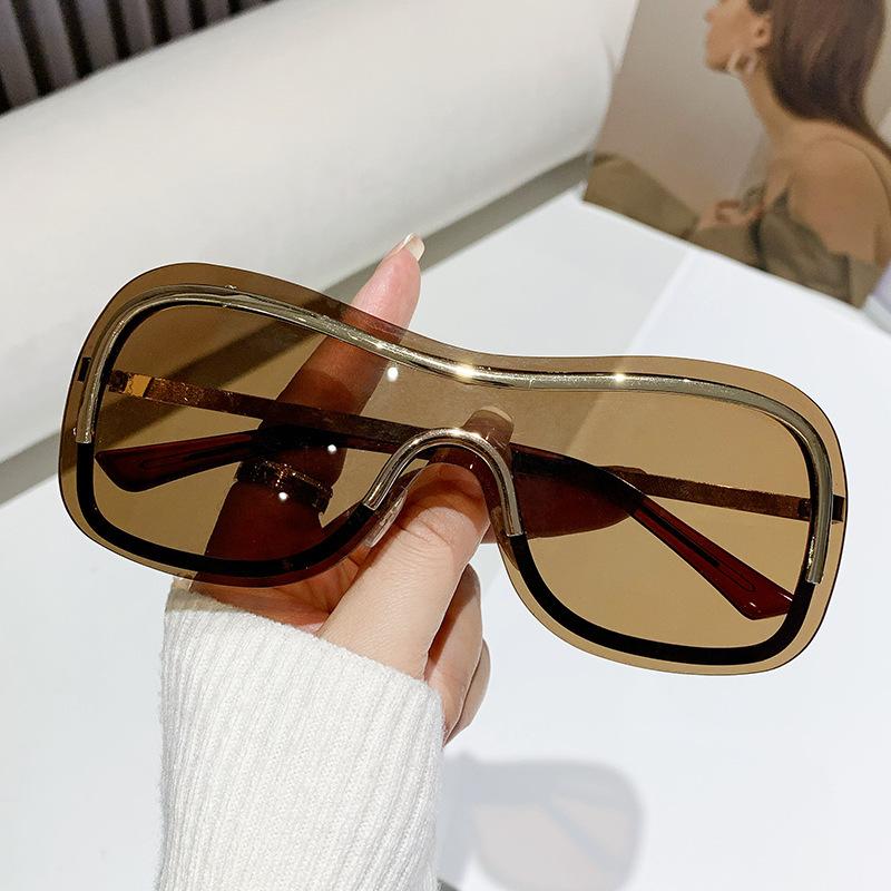 New fashion sunglasses cool one-piece metal stroke women's sunglasses frameless concave glasses men