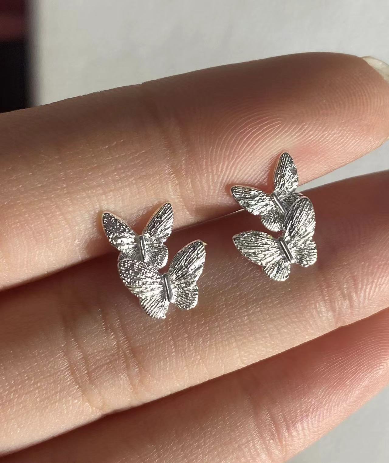 Simple and versatile double-layer butterfly stud earrings female niche design high-end temperament earbone stud fashion earrings