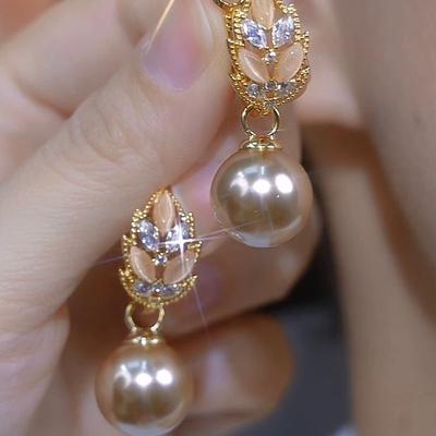 Coffee Super Flash Opal Leaf Pearl Earrings 111 Silver Needle Temperament Personality Light Luxury Earrings Earrings