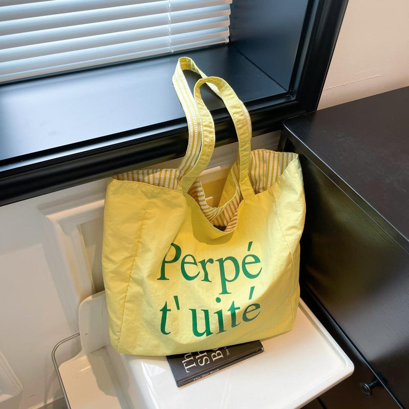 Lazy wind canvas bag 2025 summer new alphabet canvas bag female shoulder large capacity student class commute