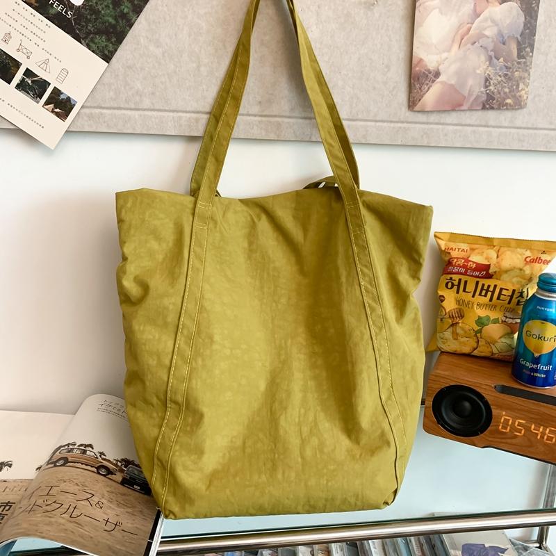 Нейлоновая сумка через плечо — фото 13