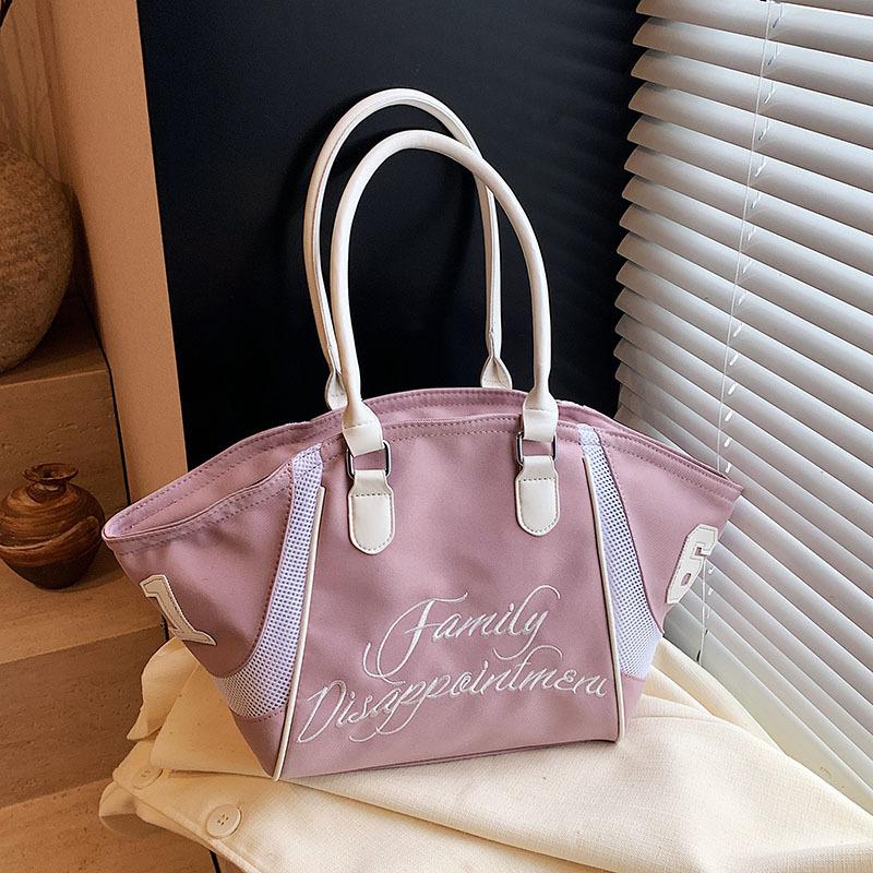 

2025 новый нишевый дизайн, сумка-тоут с буквенным принтом, универсальная, портативная, повседневная, для通勤, на плечо 48*11.5*27 фиолетовый