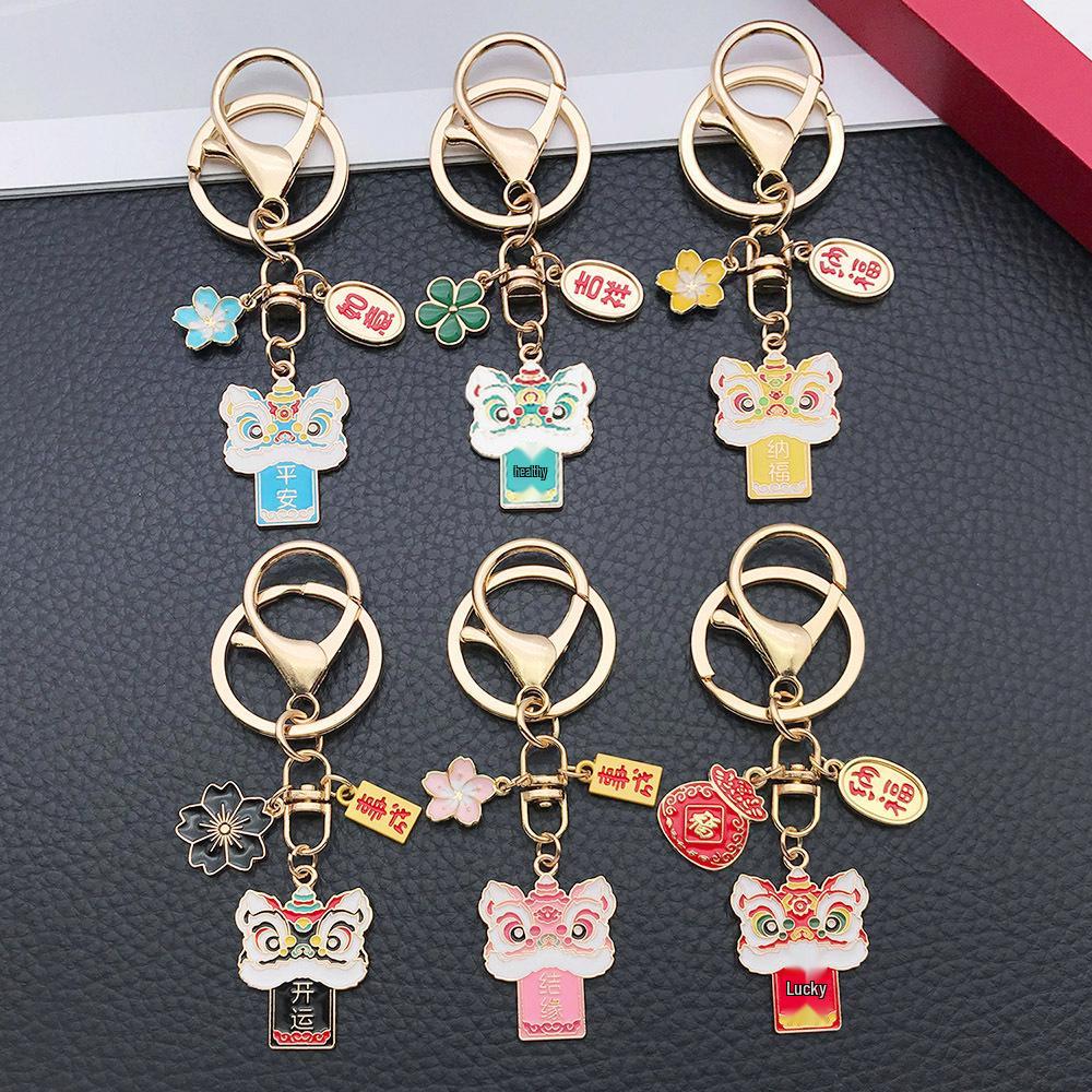 Six-Color Oil Drip Cartoon Chinese Style Keychain: Four-Leaf Clover, Cherry Blossom, Lion Pendant for Backpack