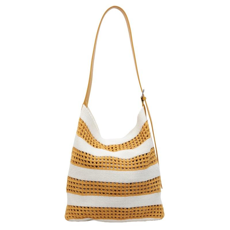 

Hollow knitting fashion splicing large-capacity bucket bag women s 2025 new go-out vacation beach versatile shoulder bag жовтий
