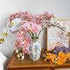 Realistyczna kompozycja z 9-głowicowej orchidei Phalaenopsis do salonu, przedpokoju, na wesele lub jako dekoracja do fotografii