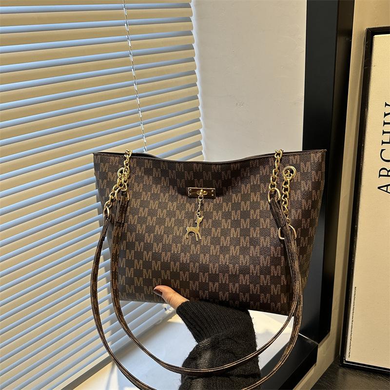 

Texture versatile personality printed retro commuter tote bag large capacity bag women ins design shoulder bag