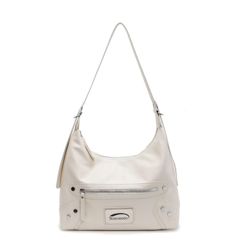 Fashion high-grade texture pu rivet large-capacity women's commuter bag exquisite locomotive underarm shoulder messenger bag