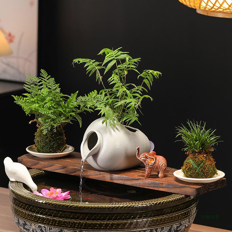Ancient Method Fish Ecosystem: Flowing Water Pottery Jar with Open Circulation for Creative Landscaping and Balcony Décor.