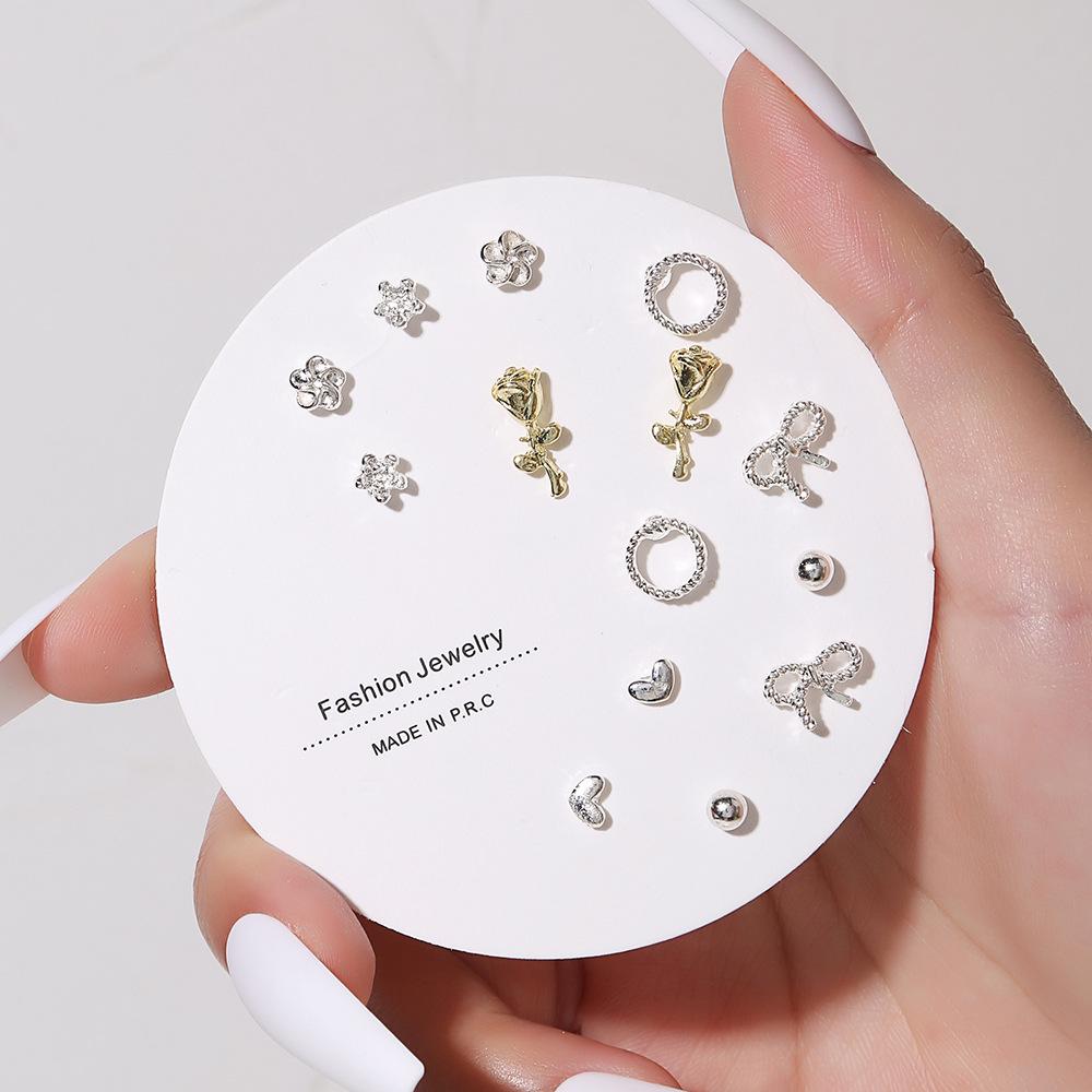 Korean version of small stud earrings, exquisite 1 pair of stud earrings a week, simple color dripping small earrings, love zircon stud earrings.