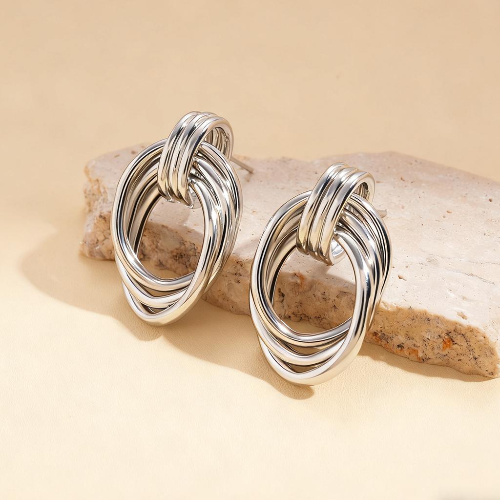 Metal winding oval hollow silver needle stud earrings environmentally friendly fashion niche earrings
