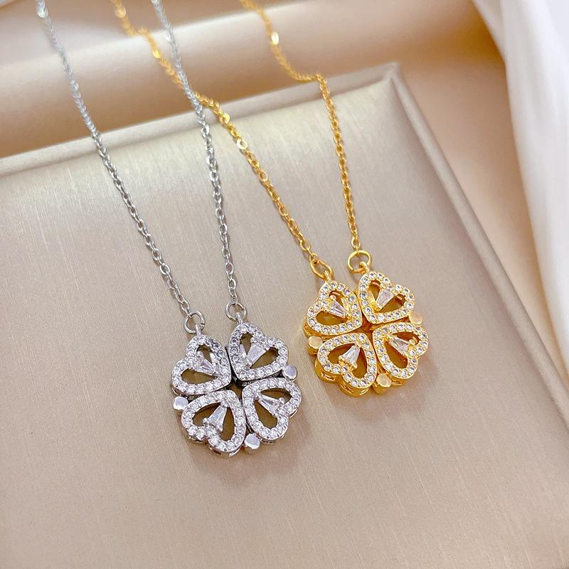 Zircón nuevo dos collares magnéticos de amor trébol de cuatro hojas temperamento lujo ligero cadena de acero de titanio.