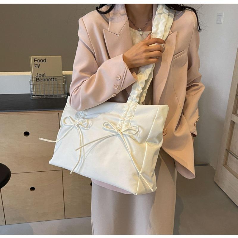 Fashion pleated niche design large capacity tote bag new bow women's bag one shoulder armpit bag