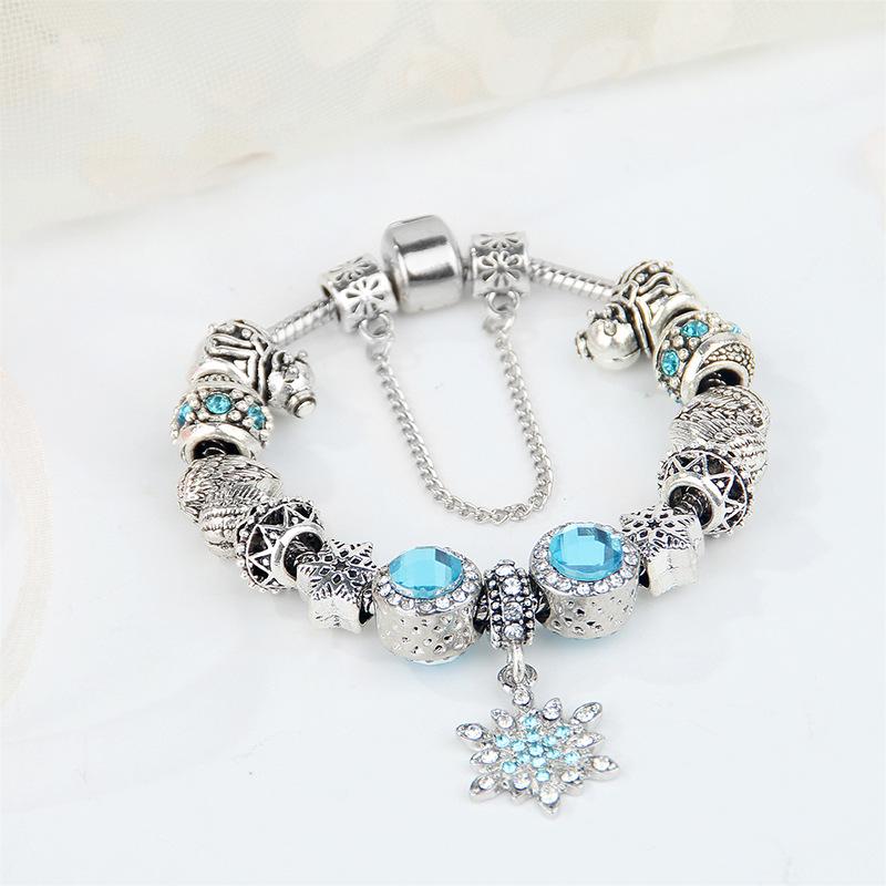 Snowflake & Santa Claus Charm Bracelet with Large Beads for Christmas.