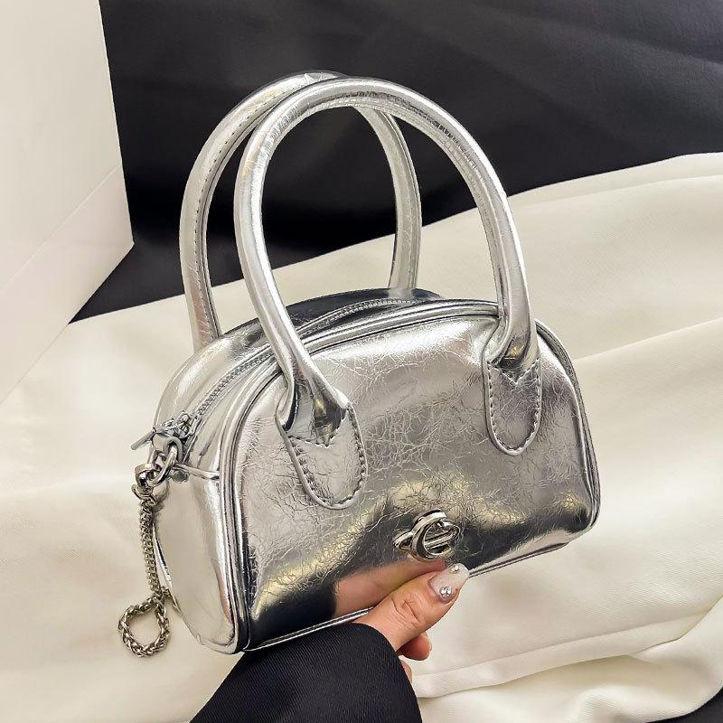 This year's new trendy high-end light luxury portable Boston bag niche design versatile solid color messenger women's bag