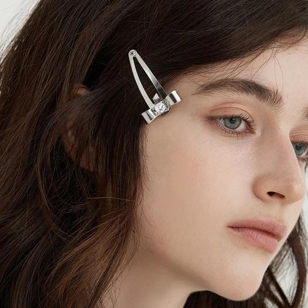 Cubic Metal Ribbon Hair Clip JP-25-045AB Gold