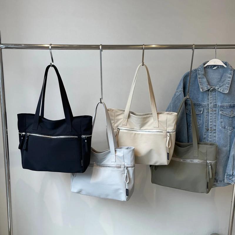 Neue lässige Reißverschluss-Umhängetaschen mit großem Fassungsvermögen im Basic-Stil, neue Hot-Sale-Taschen für junge Frauen, Damentaschen