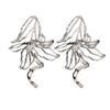 Elegant Metallic Hollow Flower Stud Earrings - European and American Fashion Statement for Women