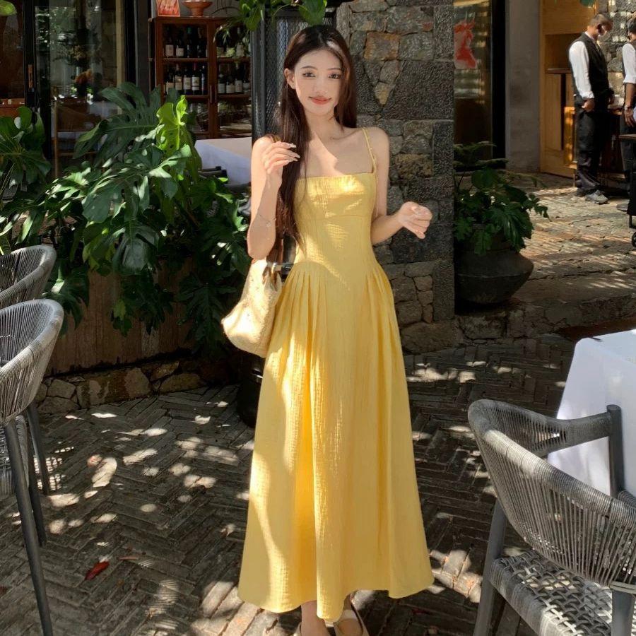 Summer New French Small Yellow Suspender Dress Women's Clothing Waist Temperament Long Dress Seaside Vacation Skirt