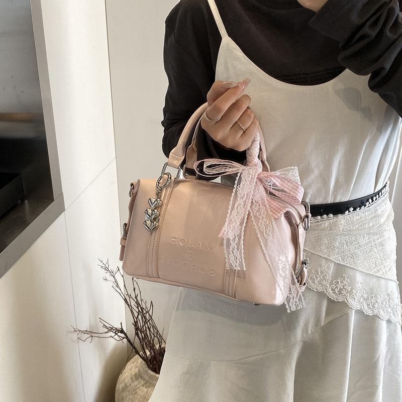 Fashion niche hand carry bowling bag women 2025 new Korean version trend high-end shoulder bag versatile messenger bag