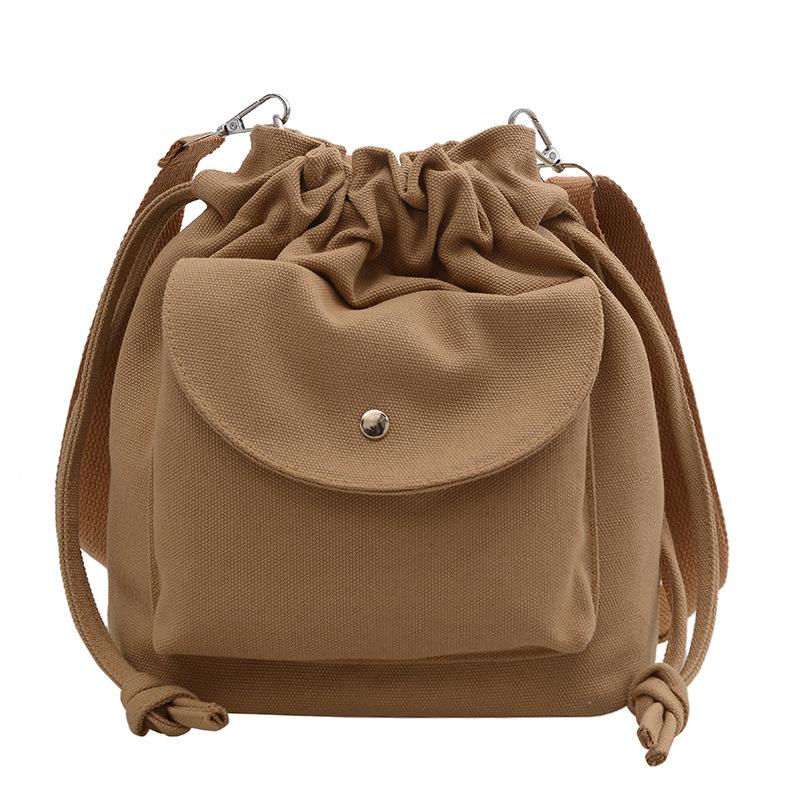 Canvas bag women's spring and summer niche drawstring one-shoulder crossbody bag pleated bucket bag