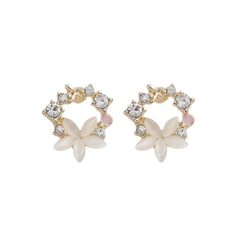 Boucles d'oreilles pendantes élégantes 2025 avec fleur en zircon œil-de-chat français et aiguilles en argent 925
