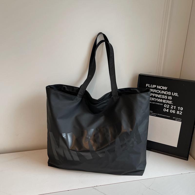 

Simple letter large capacity shoulder bag women s summer versatile small fresh canvas bag holder extra large bag чорний