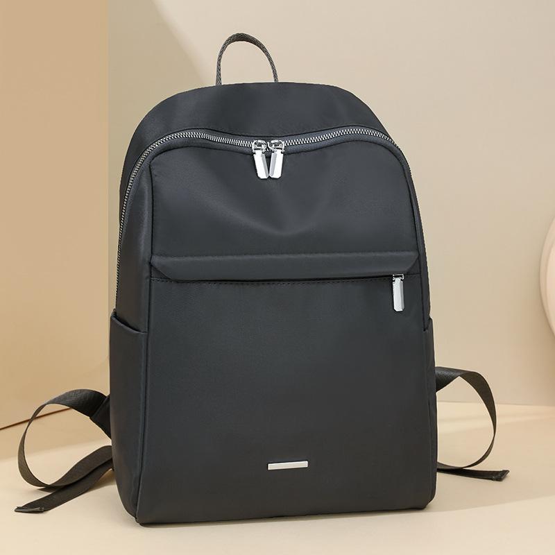 

New nylon backpack large-capacity backpack simple and fashionable college student anti-splashing light schoolbag серый