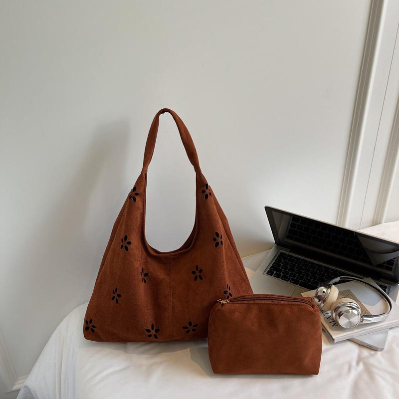 New bag women's casual hollow shoulder bag women's commute to work underarm bag literary and artistic fan tide